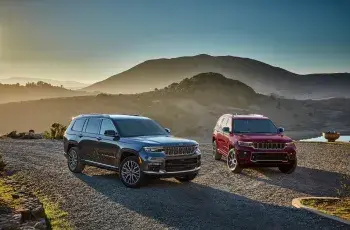 two cars Jeep Grand Cherokee L