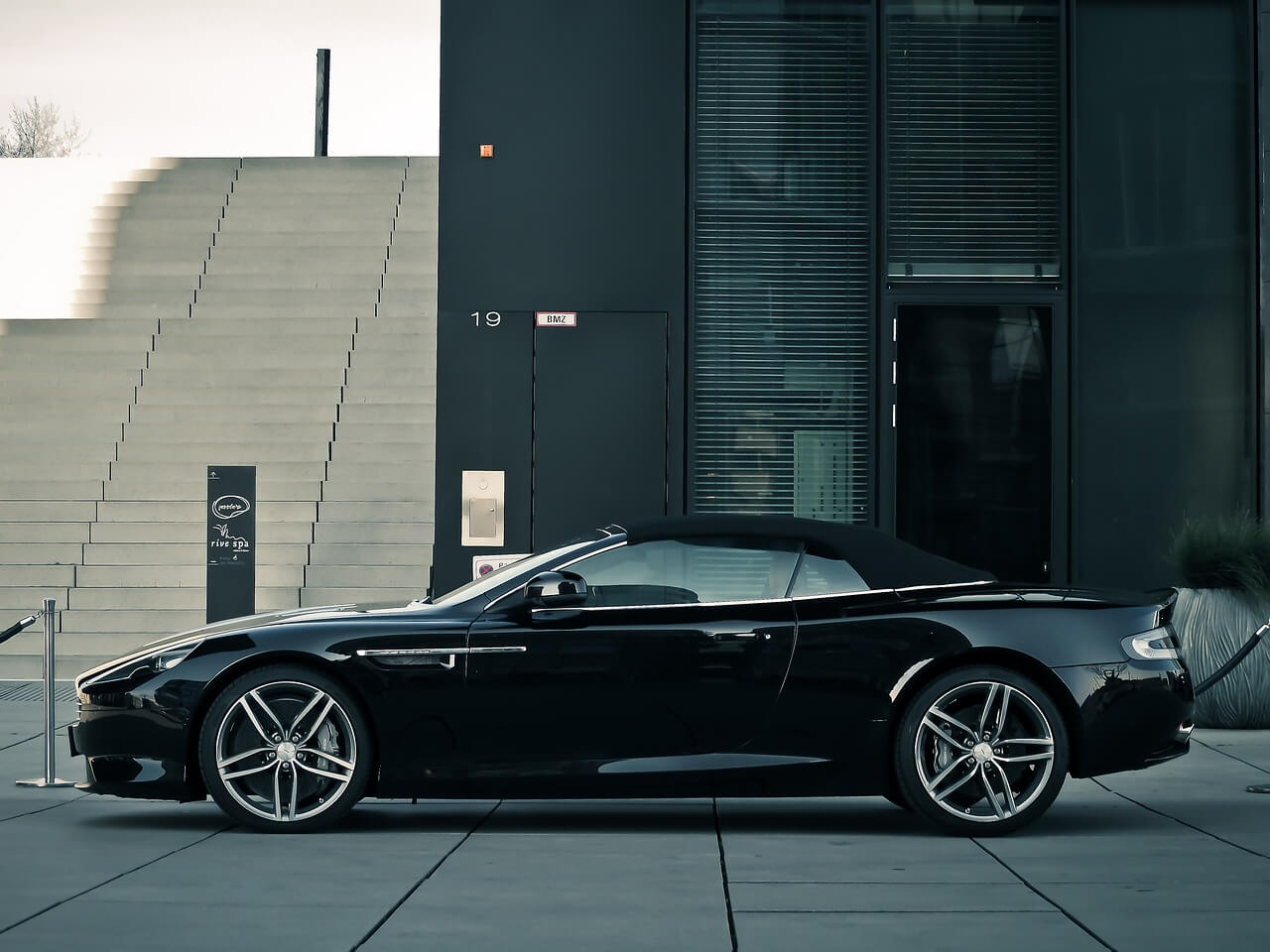 Black Aston Martin parked