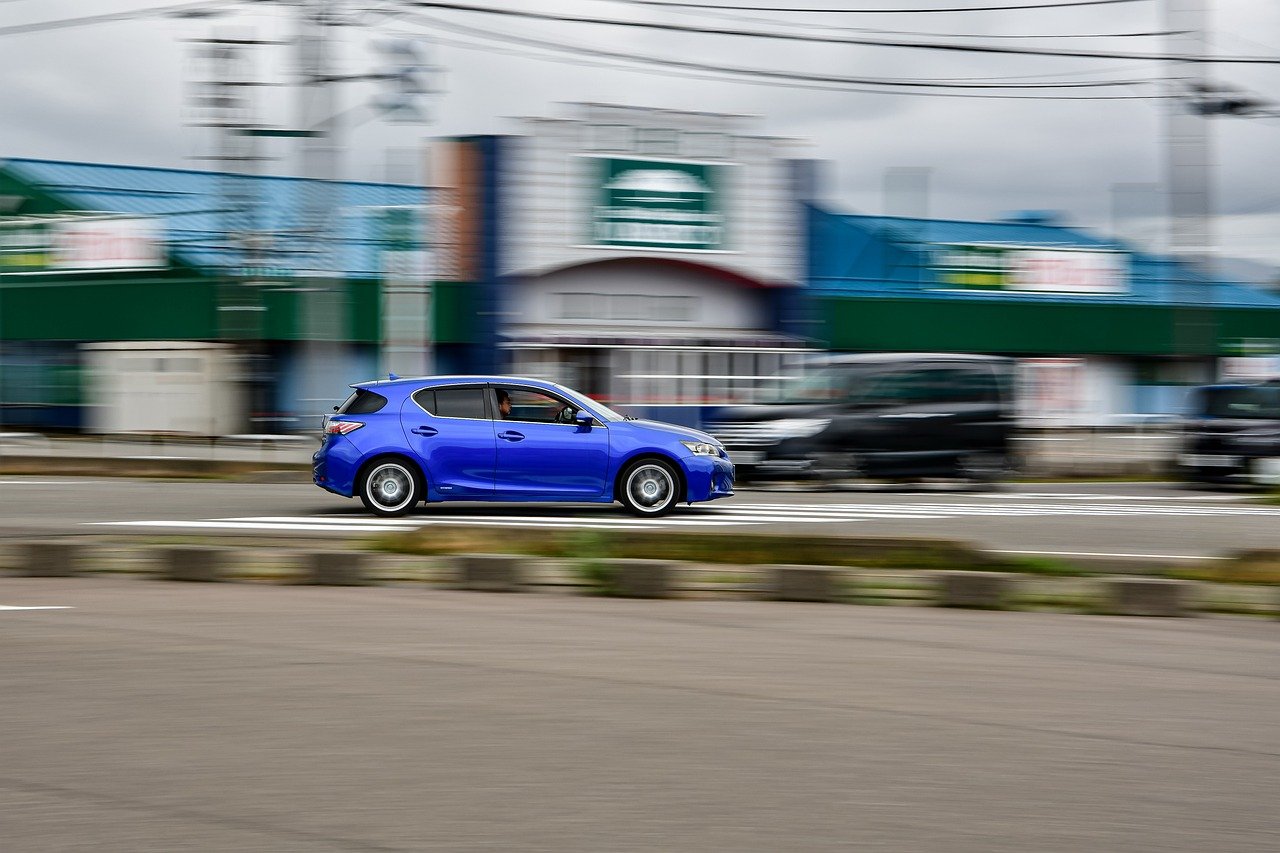 Blue Honda on the road