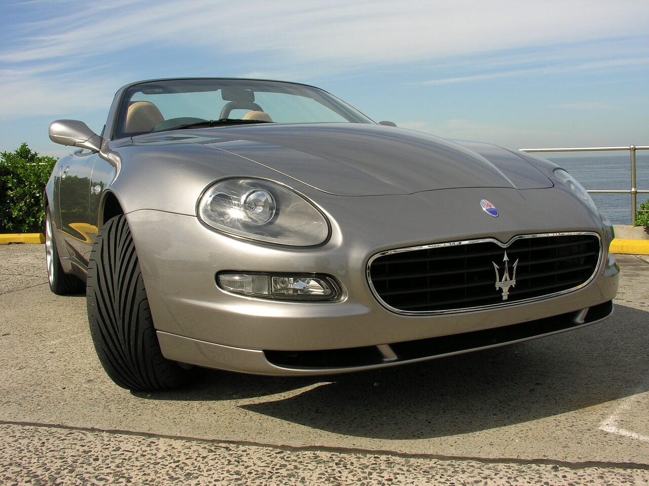 Grey Maserati with sea view