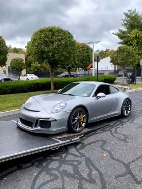 Porsche in enclosed transport