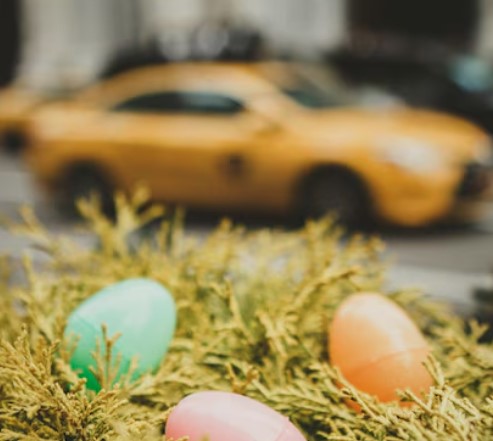 easter eggs and yellow car