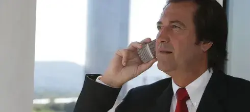 Broker talking on the phone with a client