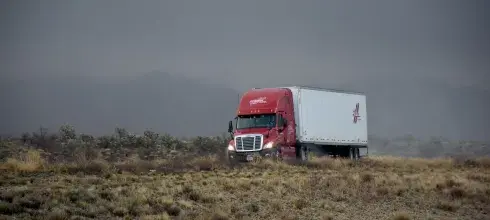 Car carrier moving on the road