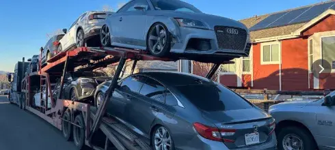 car trailer carrying cars