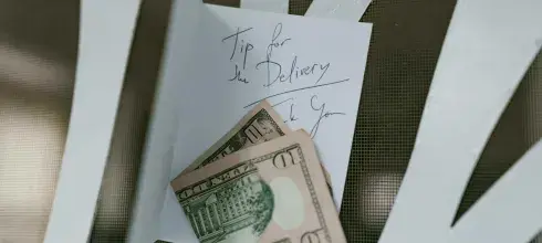 ten dollars bill and a note