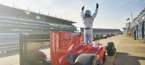 F1 car wins first place in a race