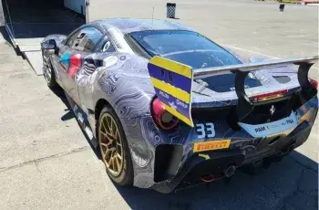 Sports car gets into a transport truck