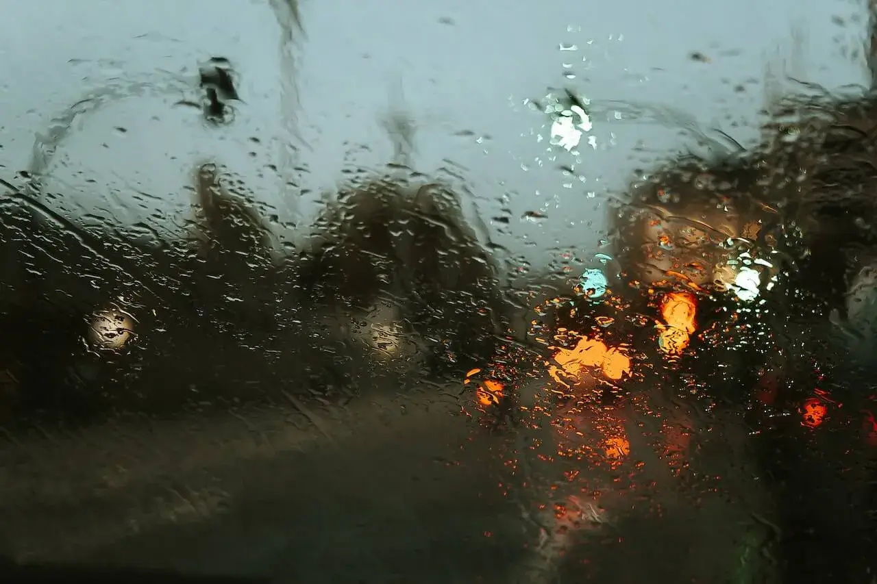 A car window full of hurricane rain drops