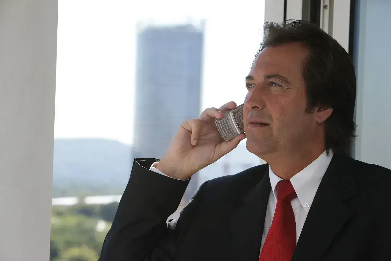 Broker talking on the phone with a client