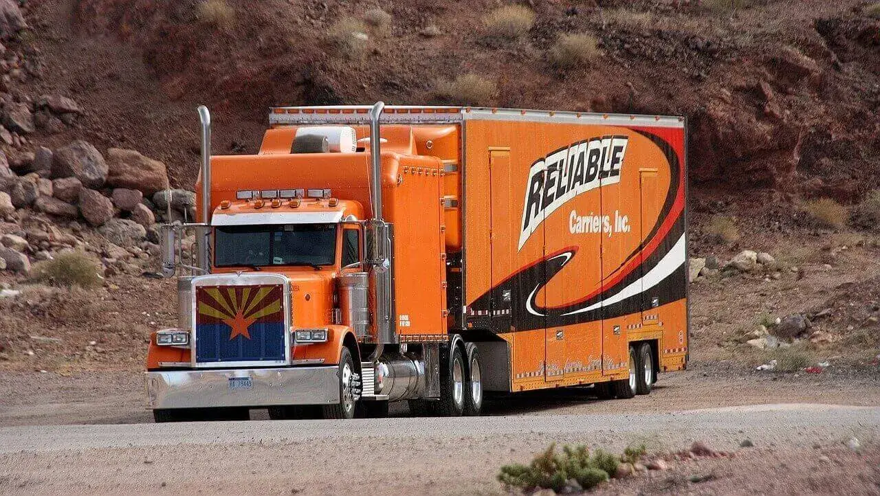 Closed truck that transports cars Closed truck that transports cars