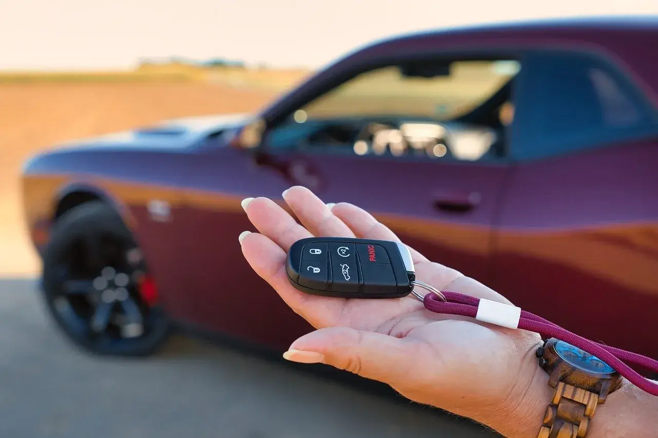 Hand that holds Dodge keys