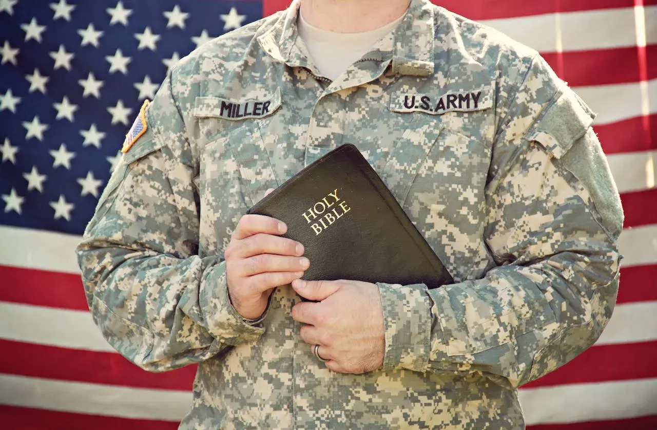 US veteran holding a bible